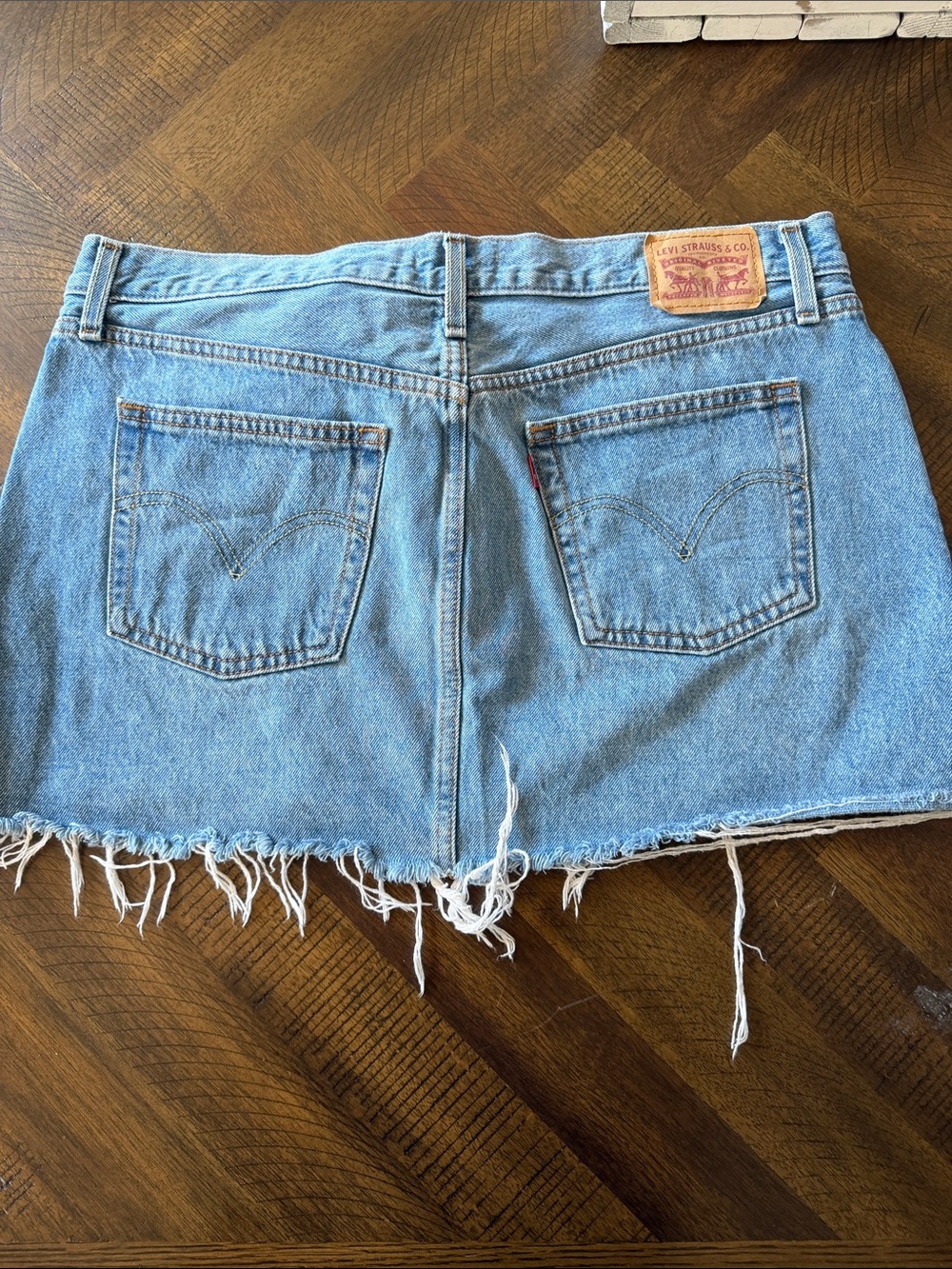 Levi's Light Blue Denim Cutoff Icon Skirt with Frayed Hem